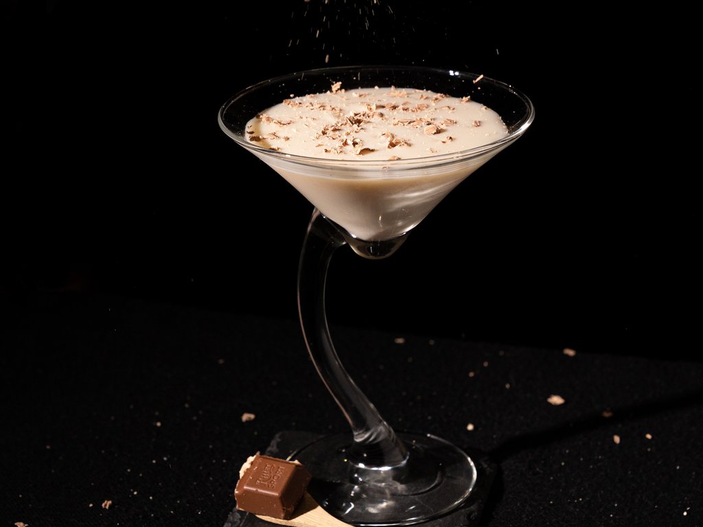 Val di Fassa and cycle track: outside our cocktail & tea bar A cocktail garnished with white chocolate shavings.